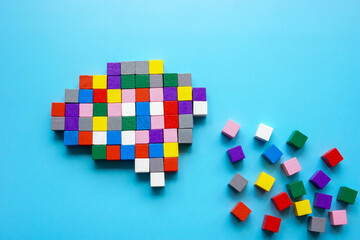 Brain made of colorful blocks with a trail. Cognitive development.