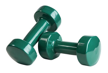 A close up shot of two green dumbbells lying on a black background in a studio setting for exercise