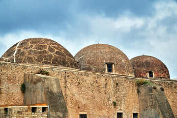 domes of stone, historic Turkish mosque in the city of Rethymnon on the island of Crete