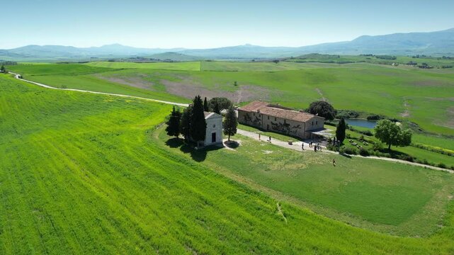 Vitaleta Chapel aerial view in the wonderful valley of D'orcia in Tuscany. Drone footage.