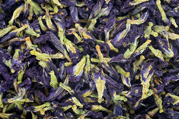 Tibetan Anchan tea as background, top view. Blue tea. Butterfly pea flower tea.