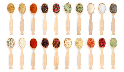 Different aromatic spices in wooden spoons on white background, set. Top view