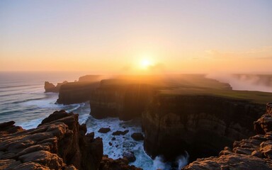 Dramatic coastal cliffs at sunrise, golden light casting shadows on rocks as ocean waves crash below. A breathtaking view of nature’s power and peace.