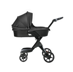 Baby carriage. Modern pram with black canopy isolated on white