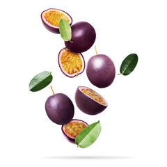 Delicious ripe passion fruits and green leaves falling on white background