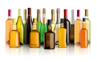 Bottles with different types of alcoholic drinks on white background, set