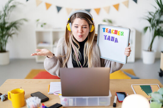 Teacher Tana is teaching online. She's using a whiteboard to help her students learn. It's a fun way to engage with kids remotely.