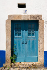Fototapeta premium blue door in the old house