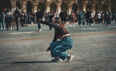 Fototapeta premium girl dancing in the square