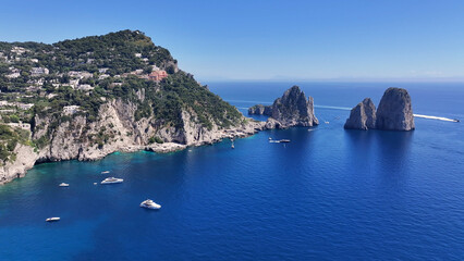 Obraz premium Capri Skyline At Naples In Campania Italy. Beach Landscape. Giant Cliffs Scene. Capri Skyline At Naples In Campania Italy. Gulf Of Naples Skyline. Mediterranean Sea Coast. Scenic Capri Island.