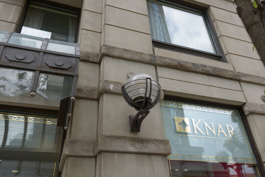 austere facade and sign of Knar Jewellery located at 38 Avenue Rd, Toronto