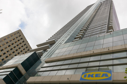 skyward glance of Aura and Ikea sign, located at 382 Yonge St, Toronto