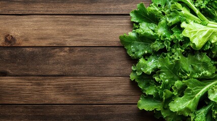 A vibrant bunch of fresh green lettuce laid on a rustic wooden surface, highlighting the contrast between the organic freshness of produce and the earthy textures of wood.