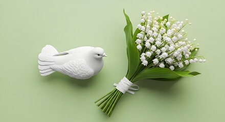 Elegant white dove figurine beside a delicate lily of the valley bouquet on a soft green background perfect for spring wedding stationery design or peace concept.