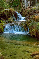 Fototapeta premium Cascada del río Guazalamanco, en el parque natural de Cazorla, Segura y Las Villas.