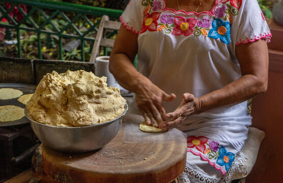 Woman making traditional tortillas in a restaurant in the old colonial town in Merida; Yucatan; Mexico