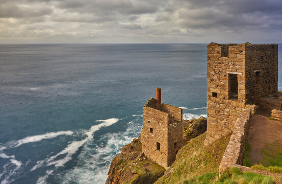 The cliffshide ruins of the engine house of Botallack tin mine, on the Atlantic coast near St Just, Cornwall, United Kingdom