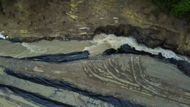 The place where the Corund stream floods the salt mine in Praid - Romania, as a result of soil erosion