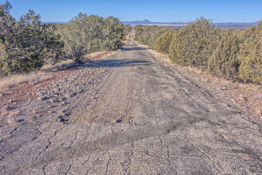 The crumbling remains of Arizona Route 66 in the Kaibab National Forest, USA