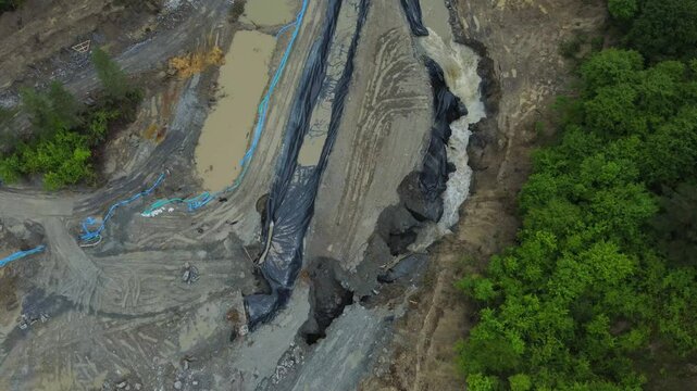 The place where the Corund stream floods the salt mine in Praid - Romania, as a result of soil erosion