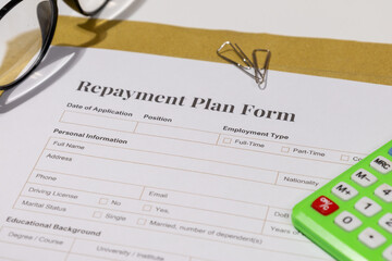 Repayment Plan Form with Pen on Desk – Financial Agreement and Debt Management Concept