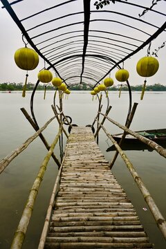 Wooden jetty on Thu Ban River, Vietnam