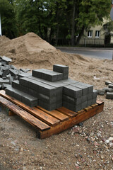 a pile of paving slabs for paving roads