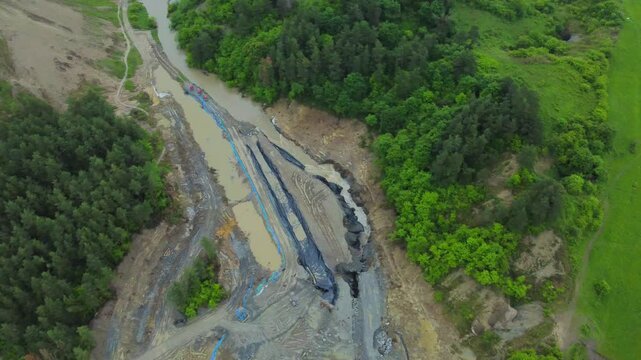 The place where the Corund stream floods the salt mine in Praid - Romania, as a result of soil erosion