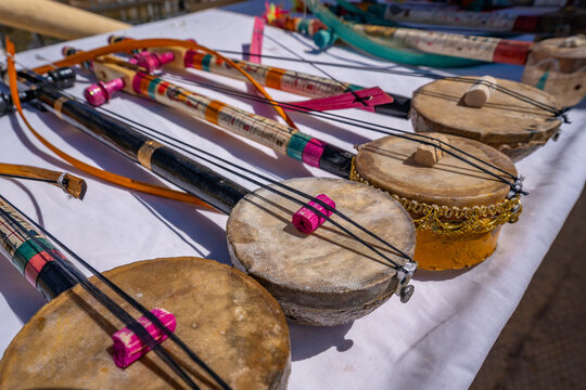 View of musical instrument souvenirs on display at Temple at Philae on a sunny day, Aswan, Nubia, Egypt, North Africa, Africa
