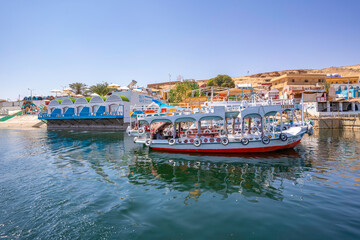 View of colourful architecture at Nagaa Suhayl Gharb on the Nile river near Aswan, Aswan, Nubia, Egypt, North Africa, Africa