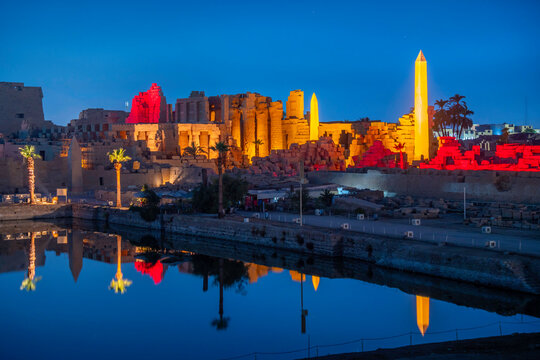 View of Karnak Temple sound and light show at dusk, Luxor, Egypt, Africa
