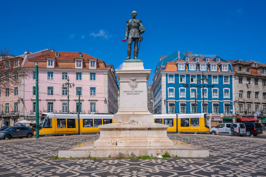 View of Duke of Terceira statue and a modern tram in PC Duque da Terceira on a sunny day, Lisbon, Portugal, Europe