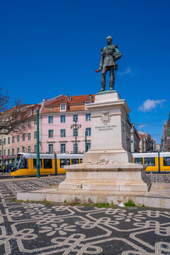 View of Duke of Terceira statue and a modern tram in PC Duque da Terceira on a sunny day, Lisbon, Portugal, Europe
