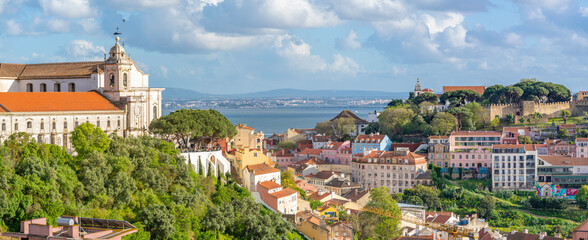 Panoramic view of Lisbon from Miradouro da Senhora do Monte scenic point on a sunny day in the Alfama District, Lisbon, Portugal, Europe