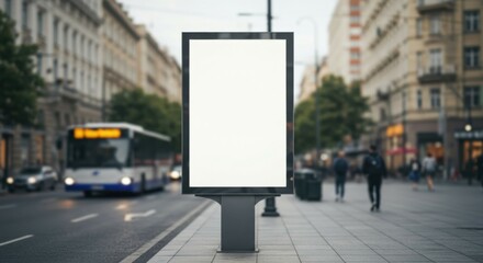 Empty advertising board in metropolitan area, capturing dynamic city elements like moving bus and people, ideal for ad mockups.