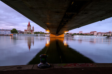 Bridge Over River with Waterfront St. Francis of Assisi Church in Vienna Austria