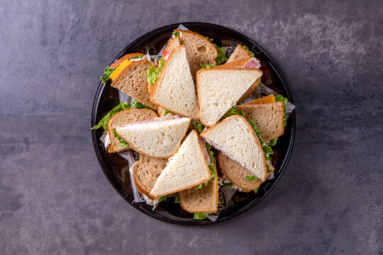 Catering tray with sandwiches cut in half 