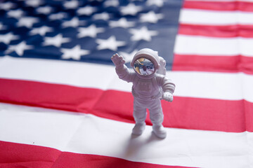 astronaut on the American flag