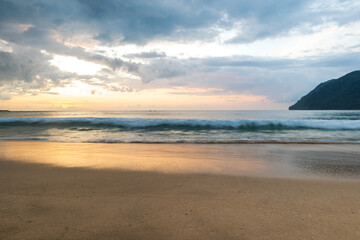 Beautiful sunset seascape at tropical beach, Lhoknga beach in Aceh, Indonesia