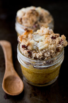 Pumpkin pie with strudel topping in small mason jars 