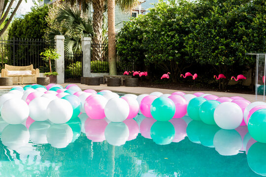 Balloons floating in a pool 