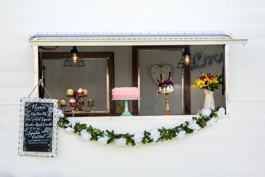 Fototapeta Open window of a dessert food truck 