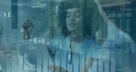 Finance analyst scanning report causing overlay showing candlestick and bar graphs for analysis - Powered by Adobe