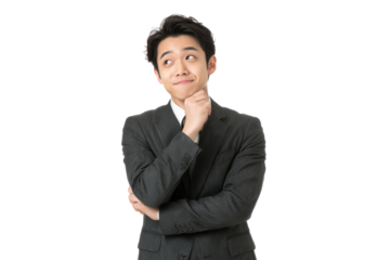 PNG Thoughtful young asian male in suit contemplating decision