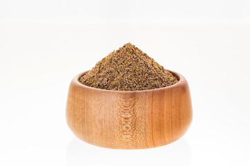 Aromatic black pepper spices in a bowl - Piper nigrum