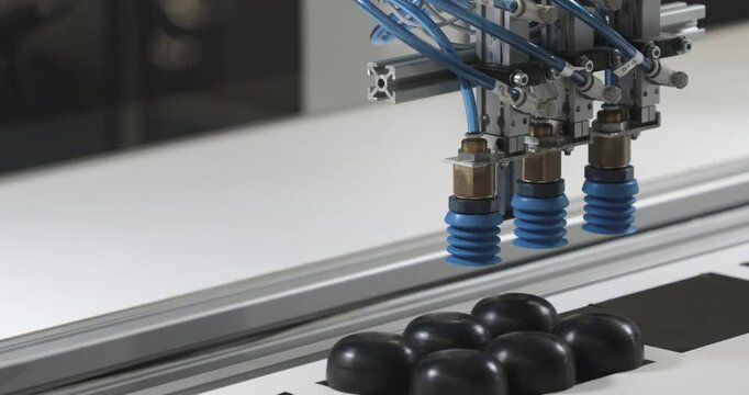 Vacuum Suction Robot Arm Picking Parts From Conveyor Belt