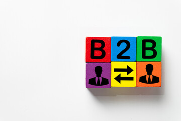 Business to Business concept.,Wooden cubes illustrating the B2B (Business to Business) icon on...