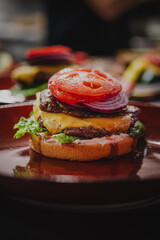 delicious cheese burger with fresh vegetables, and sesame bun, ideal for food and restaurant visuals
