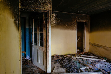 Aftermath of fire. Burnt room interior