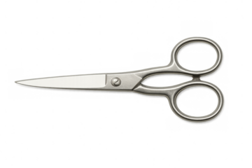 Metal scissors resting open, positioned for precise cutting against transparent surface